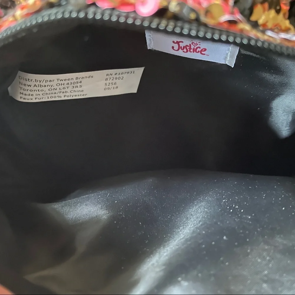 mini justice cat backpack flip sequin “F” Pom